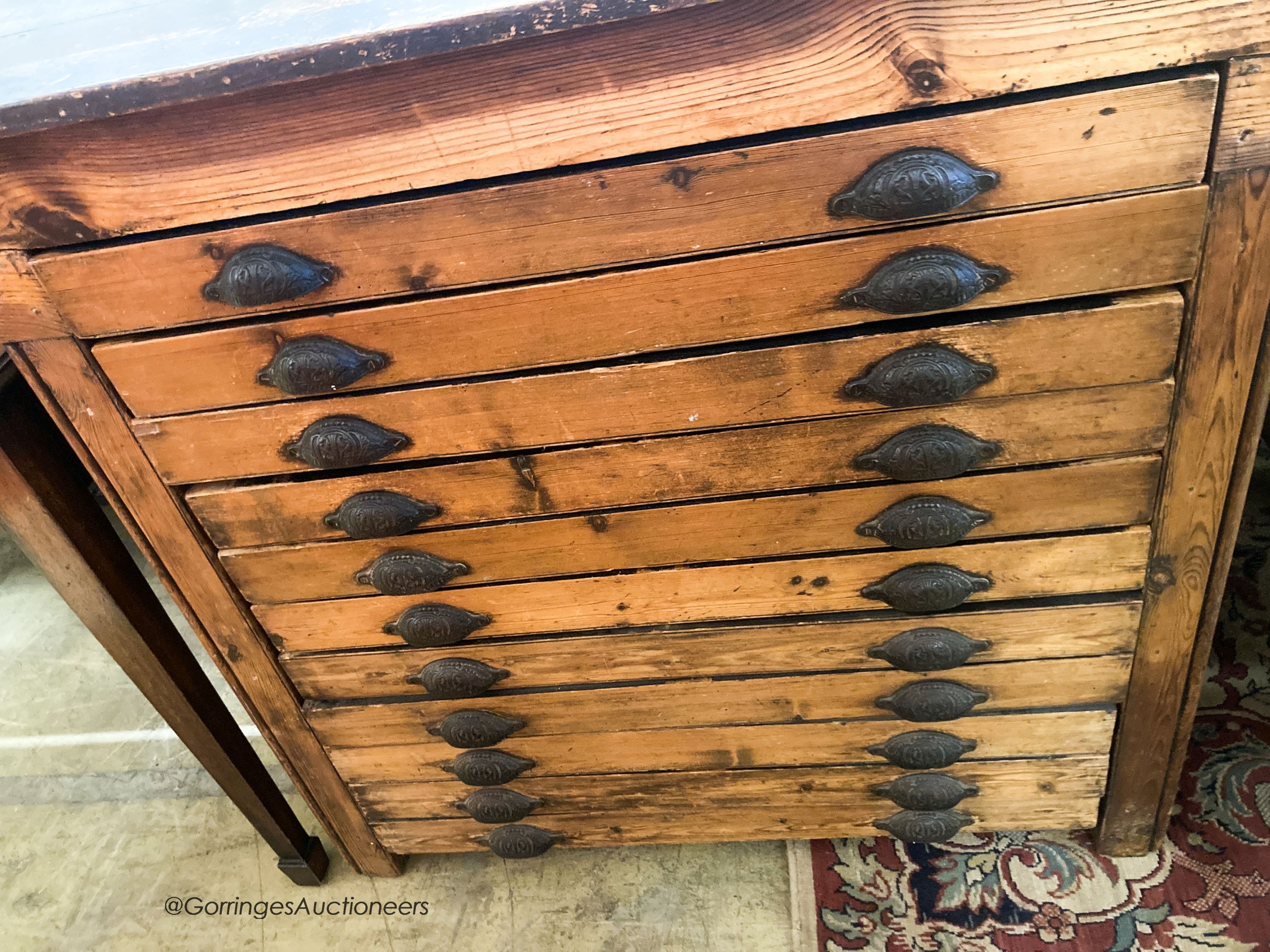 A late Victorian pine eleven drawer plan chest, W.118cm D.74cm H.101cm